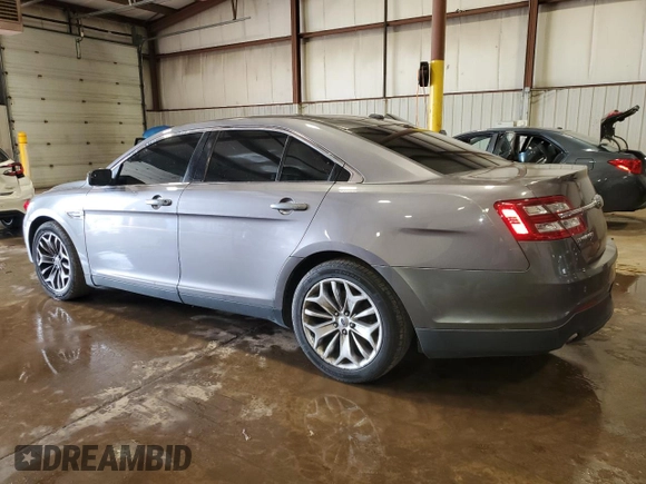 2014 Ford Taurus Limited with VIN 1FAHP2F8XEG113644, listed as a Copart auction lot 51275645 with 143,816 mi miles and Salvage title. Bid and sale history available at DreamBid. Image 2.