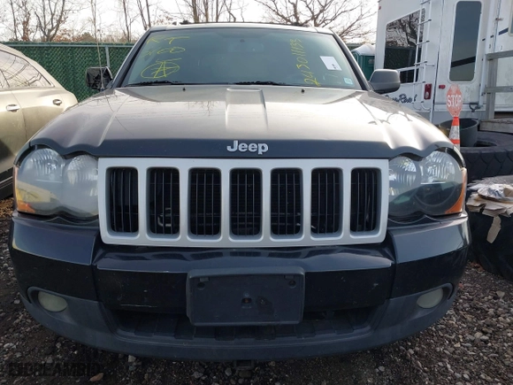 2009 Jeep Grand Cherokee Laredo with VIN 1J8GR48K29C552248, listed as a IAAI auction lot 41209184 with 194,778 mi miles. Bid and sale history available at carsss.com. Image 6.