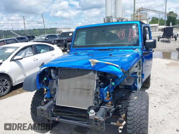 2016 Jeep Wrangler Black Bear with VIN 1C4AJWAG4GL176980, listed as a IAAI auction lot 42744445 with 58,011 mi miles and . Bid and sale history available at DreamBid. Image 12.