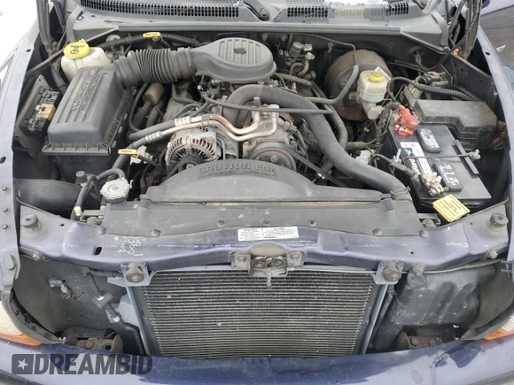 1999 Dodge Durango with VIN 1B4HS28Y3XF569044, listed as a Copart auction lot 44583815 with 70,682 mi miles and Salvage title. Bid and sale history available at DreamBid. Image 12.