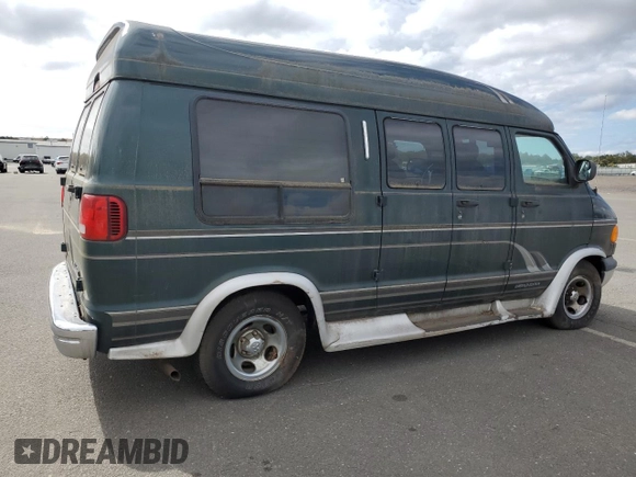 1999 Dodge Cargo Conversion z VIN 2B6HB11Y0XK505623, wystawiony jako Copart lot #71873994 z przebiegiem 69 806 mil mil oraz Nie do naprawy. Historia ofert i sprzedaży dostępna na DreamBid. Obrazek 3.