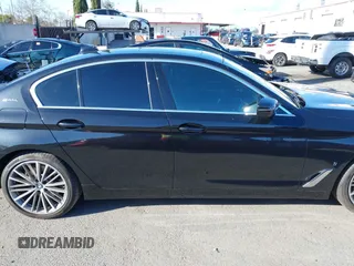 2019 BMW 5 Series 530e iPerformance with VIN WBAJA9C53KB388861, listed as a IAAI auction lot 41621712 with 68,128 mi miles. Bid and sale history available at carsss.com. Image 13.