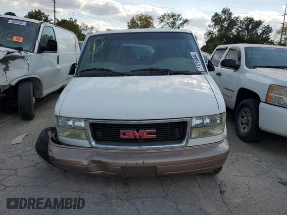 2003 GMC Safari z VIN 1GKEL19X03B503236, wystawiony jako Copart lot #71755844 z przebiegiem 109 438 mil mil oraz Szkody całkowita. Historia ofert i sprzedaży dostępna na DreamBid. Obrazek 5.