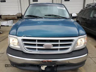 2000 Ford F-150 XL with VIN 1FTRX17W5YNA58235, listed as a Copart auction lot 84026504 with 0 mi miles and Salvage Title. Bid and sale history available at carsss.com. Image 5.