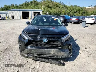 2024 Toyota RAV4 Hybrid LE with VIN 2T3UWRFV4RW201948, listed as a Copart auction lot 70400424 with 6,852 mi miles and Salvage title. Bid and sale history available at DreamBid. Image 14.