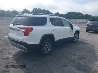 2023 GMC Acadia SLT with VIN 1GKKNML4XPZ156685, listed as a IAAI auction lot 42231988 with 61,094 mi miles and . Bid and sale history available at DreamBid. Image 4.