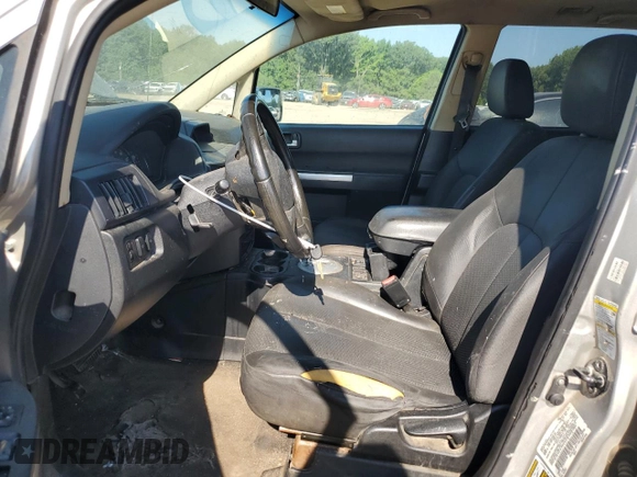 2011 Mitsubishi Endeavor LS with VIN 4A4JN2ASXBE027013, listed as a Copart auction lot 60397054 with 241,973 mi miles and Salvage Title. Bid and sale history available at carsss.com. Image 7.