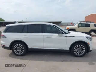 2020 Lincoln Aviator Reserve with VIN 5LM5J7WC1LGL28593, listed as a IAAI auction lot 42137327 with 83,114 mi miles and . Bid and sale history available at DreamBid. Image 13.