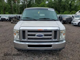 2009 Ford Econoline Passenger XL with VIN 1FBNE31L49DA74498, listed as a Copart auction lot 56381945 with 95,695 mi miles and Salvage title. Bid and sale history available at DreamBid. Image 5.