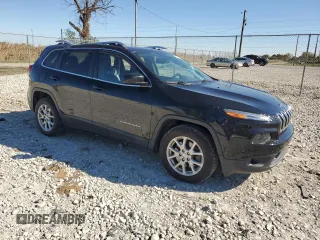 2018 Jeep Cherokee Latitude Plus with VIN 1C4PJLLXXJD557028, listed as a Copart auction lot 76671214 with 105,459 mi miles and Salvage Title. Bid and sale history available at carsss.com. Image 4.