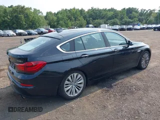 2014 BMW 5 Series GT 535i Gran Turismo xDrive with VIN WBA5M4C56ED183815, listed as a IAAI auction lot 40100547 with 150,358 mi miles and . Bid and sale history available at carsss.com. Image 4.