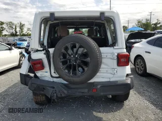 2021 Jeep Wrangler Unlimited Sahara z VIN 1C4JJXP65MW766023, wystawiony jako Copart lot #52332735 z przebiegiem 23 130 mil mil oraz Nie do naprawy • Non repairable. Historia ofert i sprzedaży dostępna na DreamBid. Obrazek 6.