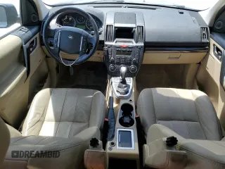 2012 Land Rover LR2 HSE z VIN SALFR2BN2CH295265, wystawiony jako Copart lot #55790655 z przebiegiem 117 660 mil mil oraz Szkody całkowita. Historia ofert i sprzedaży dostępna na DreamBid. Obrazek 8.