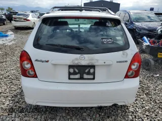2002 Mazda Protege z VIN JM1BJ245721470434, wystawiony jako Copart lot #57293765 z przebiegiem 144 622 mil mil oraz Szkoda całkowita • Salvage title. Historia ofert i sprzedaży dostępna na DreamBid. Obrazek 6.