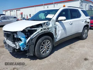 2023 Chevrolet Traverse LT Cloth with VIN 1GNEVGKWXPJ226057, listed as a IAAI auction lot 41940599 with 12,670 mi miles. Bid and sale history available at carsss.com. Image 2.