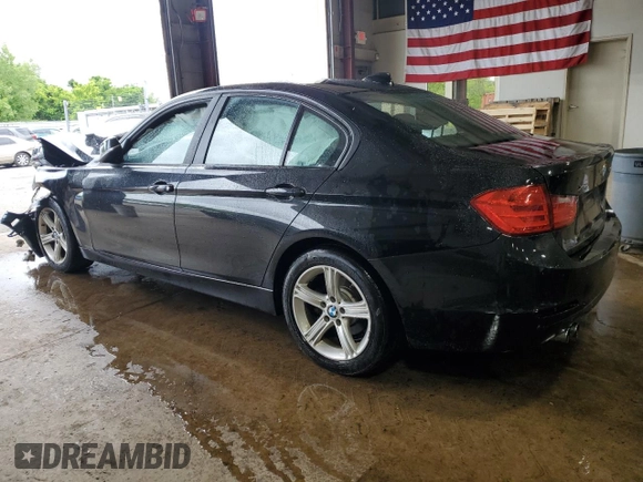 2015 BMW 3 Series 328i xDrive with VIN WBA3B5G51FNS15689, listed as a Copart auction lot 57983565 with Not provided miles and Salvage title. Bid and sale history available at DreamBid. Image 2.
