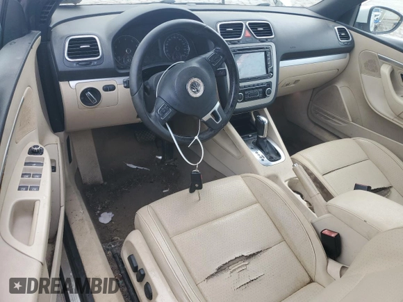 2012 Volkswagen Eos Komfort с VIN WVWBW7AH5CV000345, выставлен на аукционе Copart как лот 56725995 с пробегом 130 903 миль миль и Списание • Salvage title. История ставок и продаж доступна на DreamBid. Изображение 7.