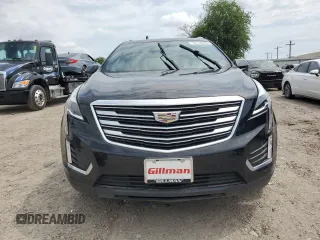 2019 Cadillac XT5 Premium Luxury FWD with VIN 1GYKNERS2KZ235309, listed as a Copart auction lot 54136495 with 133,964 mi miles and Salvage title. Bid and sale history available at DreamBid. Image 5.