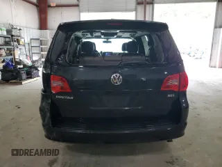 2012 Volkswagen Routan z VIN 2C4RVADG0CR355752, wystawiony jako Copart lot #53687155 z przebiegiem 132 903 mil mil oraz Szkoda całkowita • Salvage title. Historia ofert i sprzedaży dostępna na DreamBid. Obrazek 6.