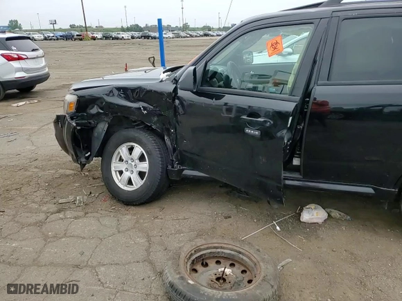 2010 Mercury Mariner with VIN 4M2CN8BG5AKJ00599, listed as a Copart auction lot 79773304 with 48,482 mi miles and Non Repairable. Bid and sale history available at carsss.com. Image 11.