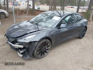 2021 Tesla Model 3 Performance with VIN 5YJ3E1EC1MF925515, listed as a IAAI auction lot 41721548 with 36,478 mi miles and . Bid and sale history available at carsss.com. Image 2.