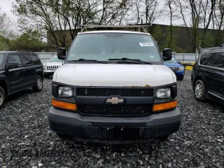 2013 Chevrolet Express Cargo z VIN 1GCWGFFA7D1103926, wystawiony jako Copart lot #55557045 z przebiegiem 284 824 mil mil oraz Tytuł czysty. Historia ofert i sprzedaży dostępna na DreamBid. Obrazek 5.