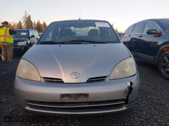 2003 Toyota Prius with VIN JT2BK18U730080829, listed as a IAAI auction lot 41359631 with 129,155 mi miles. Bid and sale history available at carsss.com. Image 12.