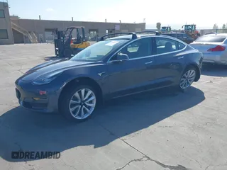 2018 Tesla Model 3 Long Range Battery with VIN 5YJ3E1EA4JF024102, listed as a IAAI auction lot 42100621 with 86,298 mi miles and . Bid and sale history available at DreamBid. Image 19.