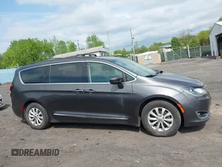 2017 Chrysler Pacifica Touring L with VIN 2C4RC1BG5HR705277, listed as a IAAI auction lot 42230036 with 75,287 mi miles and . Bid and sale history available at DreamBid. Image 13.