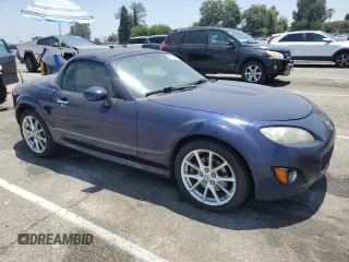 2010 Mazda MX-5 Miata Grand Touring with VIN JM1NC2FF9A0208674, listed as a Copart auction lot 63429065 with 166,294 mi miles and Clean title. Bid and sale history available at DreamBid. Image 4.