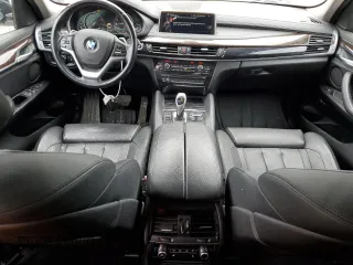 2015 BMW X6 xDrive35i z VIN 5UXKU2C58F0N77172, wystawiony jako Copart lot #55631415 z przebiegiem 246 622 mil mil oraz Tytuł czysty. Historia ofert i sprzedaży dostępna na DreamBid. Obrazek 8.
