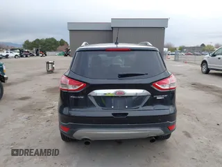 2015 Ford Escape Titanium with VIN 1FMCU9J96FUA27221, listed as a IAAI auction lot 41925276 with 180,758 mi miles and . Bid and sale history available at carsss.com. Image 16.