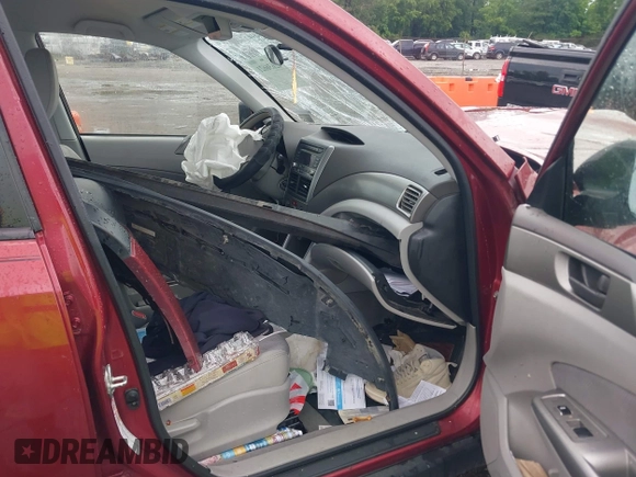 2010 Subaru Forester X with VIN JF2SH6AC0AH754937, listed as a IAAI auction lot 42636621 with Not provided miles and . Bid and sale history available at DreamBid. Image 5.