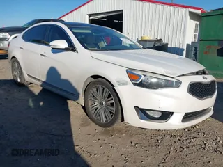 2015 Kia Cadenza Premium with VIN KNALN4D77F5170135, listed as a IAAI auction lot 41310337 with 237,376 mi miles. Bid and sale history available at carsss.com. Image 1.