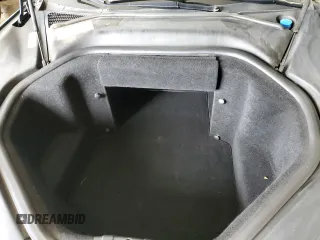 2013 Tesla Model S z VIN 5YJSA1DN0DFP26935, wystawiony jako Copart lot #45081995 z przebiegiem 120 048 mil mil oraz Szkoda całkowita • Salvage title. Historia ofert i sprzedaży dostępna na DreamBid. Obrazek 11.