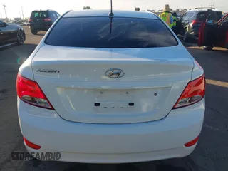 2016 Hyundai Accent SE z VIN KMHCT4AE0GU062891, wystawiony jako IAAI lot #40989721 z przebiegiem 128 457 mil mil oraz . Historia ofert i sprzedaży dostępna na DreamBid. Obrazek 17.