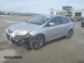 2014 Ford Focus SE with VIN 1FADP3F24EL264003, listed as a Copart auction lot 43800485 with 138,390 mi miles and Salvage Title. Bid and sale history available at DreamBid. Image 1.