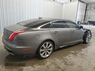 2019 Jaguar XJ Portfolio with VIN SAJWA2G71K8W19797, listed as a Copart auction lot 54133195 with 57,446 mi miles and Salvage Title. Bid and sale history available at DreamBid. Image 3.