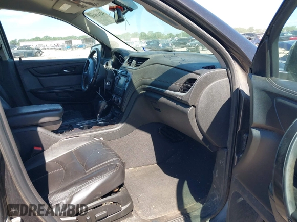 2015 Chevrolet Traverse LT with VIN 1GNKRHKDXFJ274152, listed as a IAAI auction lot 42215591 with 179,866 mi miles and . Bid and sale history available at DreamBid. Image 5.