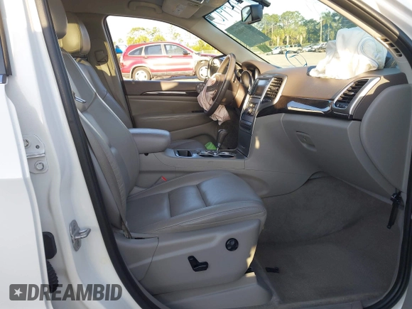 2011 Jeep Grand Cherokee Laredo with VIN 1J4RS4GGXBC739433, listed as a IAAI auction lot 41794031 with 174,672 mi miles and . Bid and sale history available at DreamBid. Image 5.