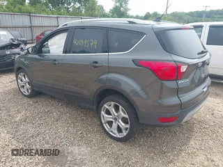 2019 Ford Escape Titanium with VIN 1FMCU0J97KUA34281, listed as a IAAI auction lot 42409579 with 55,400 mi miles and . Bid and sale history available at DreamBid. Image 3.