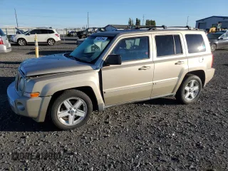 2010 Jeep Patriot Limited with VIN 1J4NF4GB1AD637311, listed as a Copart auction lot 74329164 with 103,989 mi miles and Salvage Title. Bid and sale history available at carsss.com. Image 1.