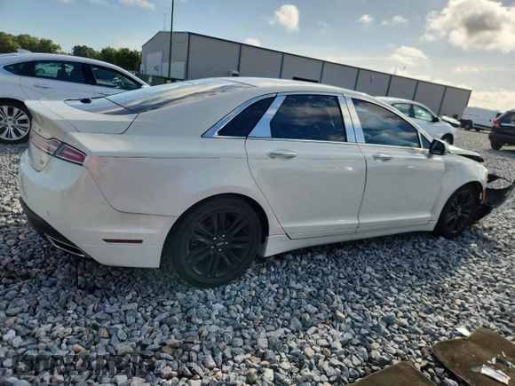 2013 Lincoln MKZ z VIN 3LN6L2GK1DR816558, wystawiony jako Copart lot #60424415 z przebiegiem 95 593 mil mil oraz Szkoda całkowita • Salvage title. Historia ofert i sprzedaży dostępna na DreamBid. Obrazek 3.