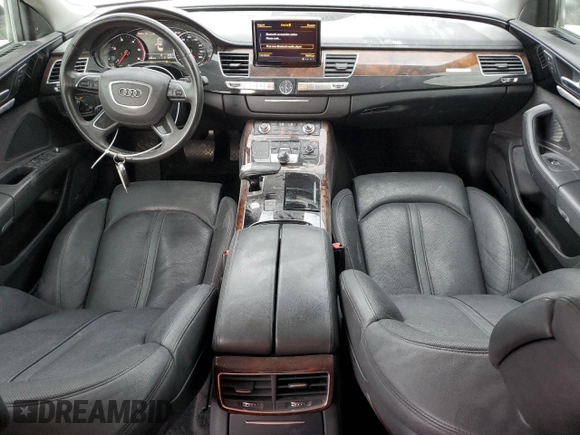 2014 Audi A8 3.0L TDI with VIN WAURMAFD8EN000802, listed as a Copart auction lot 41594755 with 131,171 mi miles and Salvage title. Bid and sale history available at DreamBid. Image 8.