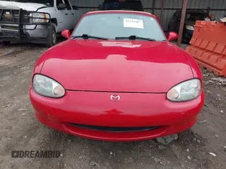 1999 Mazda MX-5 Miata with VIN JM1NB3531X0120856, listed as a IAAI auction lot 41531407 with 92,512 mi miles and . Bid and sale history available at DreamBid. Image 12.
