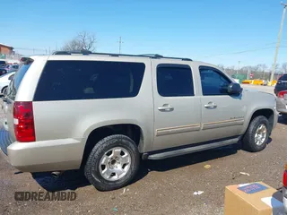 2014 Chevrolet Suburban LT with VIN 1GNSCJE07ER120130, listed as a IAAI auction lot 41792310 with 238,313 mi miles. Bid and sale history available at carsss.com. Image 13.