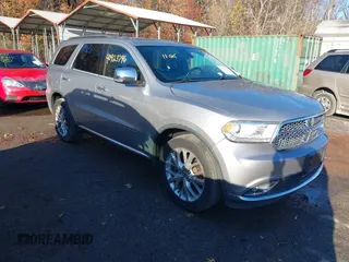 2014 Dodge Durango Citadel z VIN 1C4SDJET4EC331577, wystawiony jako IAAI lot #40923796 z przebiegiem 83 154 mil mil oraz . Historia ofert i sprzedaży dostępna na DreamBid. Obrazek 1.