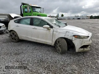 2017 Ford Fusion Titanium z VIN 3FA6P0K93HR227511, wystawiony jako Copart lot #60719505 z przebiegiem Nie podano mil oraz Szkoda całkowita • Salvage title. Historia ofert i sprzedaży dostępna na DreamBid. Obrazek 4.