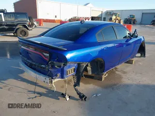 2019 Dodge Charger Scat Pack with VIN 2C3CDXGJ9KH736009, listed as a IAAI auction lot 41387223 with Not Provided miles and . Bid and sale history available at DreamBid. Image 4.