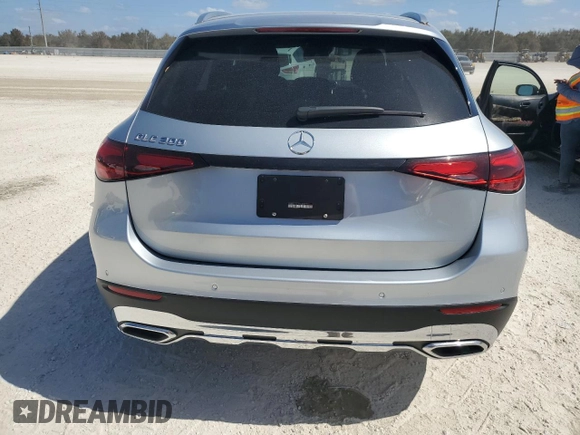 2023 Mercedes-Benz GLC with VIN W1NKM4GB3PF002580, listed as a Copart auction lot 77246444 with 0 mi miles and Salvage Title. Bid and sale history available at carsss.com. Image 6.
